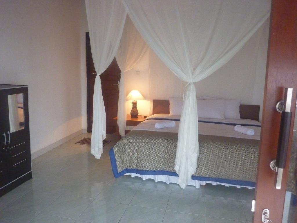 Tambun Sari Beach Homestay Amed Quarto foto